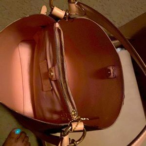 Coach crossbody/tote bag.. pink and brown with matching pick wallet..